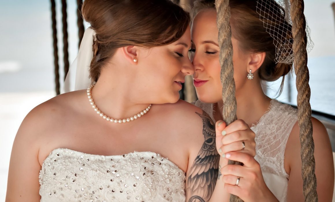 Shari & Catherine’s Lipstick Lesbian Wedding at Bluebay Grand Esmeralda